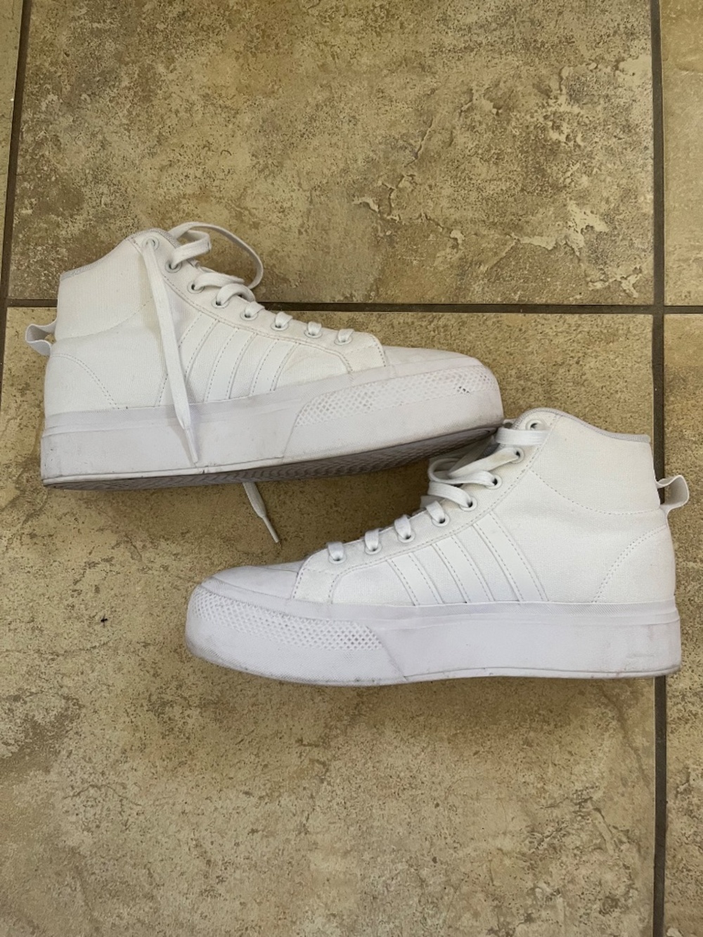White Adidas Bravada 2.0 high top size 10